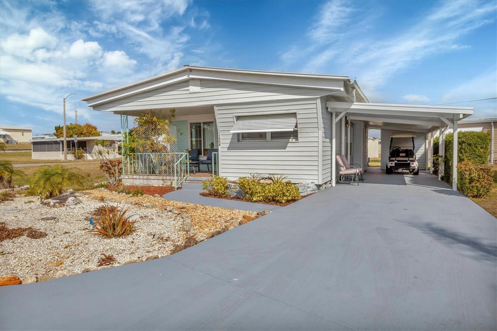Tidevue Estates is a LAND OWNED, 55+ community. The home is ideally situated on a corner lot, directly across from the Community Pool and Recreational Center. Enjoy the charm of the open front porch with its original Terrazzo flooring. The home includes a Golf Cart for your convenience. The add-on side is constructed with block, and the home features updated windows, replaced plumbing in both bathrooms, and an updated AC system with new duct work in 2023. Inside, you'll find laminate flooring throughout, except in the kitchen and dining room. The walls are finished with drywall, and the kitchen offers a pleasant view from the sink and an eat-in breakfast nook. The split bedroom plan provides privacy, with the primary bedroom offering an open porch, an ensuite bathroom with a walk-in shower, and an inside laundry room. Located close to the recreational center and pool, this home has everything you need for a comfortable and active lifestyle. Low HOA of only $600 annually. Pets are not permitted. Plenty of activities to keep you busy in this community.
Take a water aerobics class in the solar-heated community pool or work on your tan. The community library has free WI-FI connection. Updated fitness center. Meet friends and make new ones for a game of indoor pickle ball, bocce ball, or shuffleboard. Join the Golf League. Take a bike or golf cart ride to Veteran's Park to watch the wildlife and sunset. Ellenton Premium Outlet Mall, restaurants, and medical facilities are just minutes away. Easy access to I-75. Explore Sarasota and visit University Town Center Mall, St. Armand's Circle, Selby Botanical Gardens, and the Ringling Mansion & Museum. Not to mention a short drive to our beautiful Gulf Beaches.
