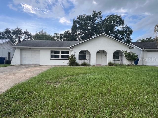 Welcome to this charming 3-bedroom, 2-bathroom home with 1,872 sq. ft. of living space in the heart of New Port Richey. Inside, a bright open layout offers a warm atmosphere, with spacious living areas perfect for daily living or entertaining. The split-bedroom design ensures privacy, featuring a primary suite with en-suite bath and walk-in closet. A second bedroom and full bath provide space for family, guests, or a home office. Outdoors, enjoy a large backyard ideal for relaxing, gardening, or hosting gatherings in the Florida sunshine. Located in the Pasco County School District, with nearby schools including Seven Springs Elementary, Seven Springs Middle, and James W. Mitchell High. Conveniently close to shopping, dining, and major highways, this home blends comfort and convenience in a desirable location.