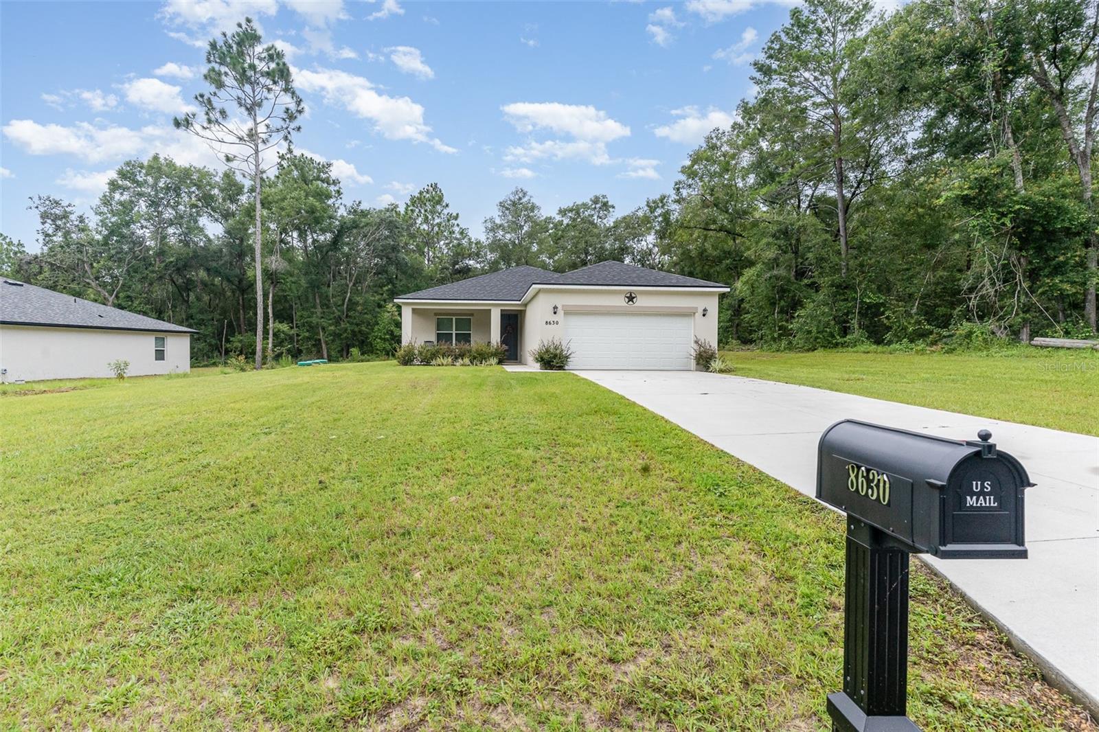 Discover this stunning 2023-built home, situated near the Withlacoochee State Trail, the newly developed shops in Lecanto, and just 20 minutes from the historic downtown Crystal River. Designed with modern upgrades, this home features soaring 9-foot tray ceilings, 8-foot doors, expansive windows, and state-of-the-art smart appliances. Offering over 1,600 sq ft of open-concept living space, this 3-bedroom, 2-bathroom home boasts a highly functional layout ideal for families.