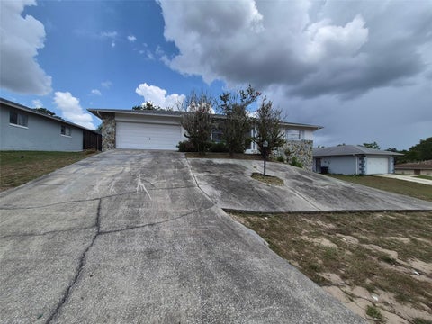 Photo of 229 W Casurina Place, Beverly Hills, FL 34465 (MLS # OM727445)