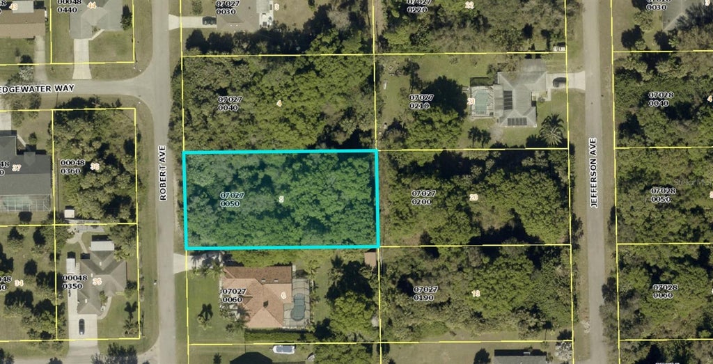 Photo of 614 Robert Avenue, Lehigh Acres, FL 33936 (MLS # OM727564)