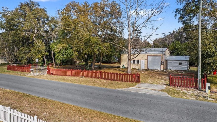 Opportunity shines in Floral City! This fully fenced property features a permitted metal building, now a charming 1-bedroom, 1-bath apartment complete with a full kitchen and a convenient laundry room. Set on two spacious, cleared lots totaling 0.36 acres, it offers room to grow. Plus, it’s already equipped with electricity, septic, and city water. Whether you’re expanding or settling right in, this property blends comfort, function, and endless potential!