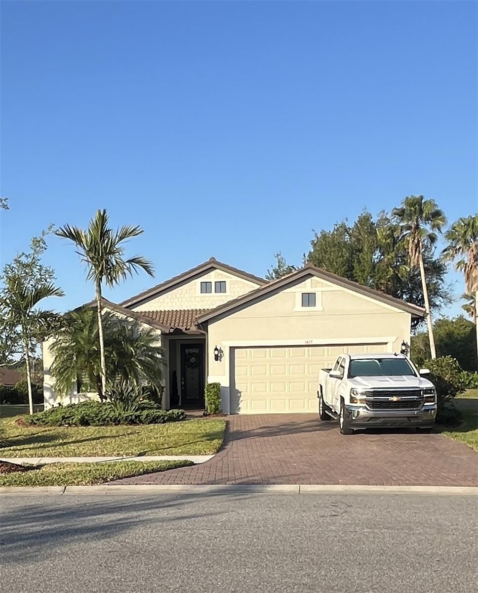 PRIVATE POOL AND SPA ! - Welcome to This 2018 home is like new on an oversized lot with southwestern exposure. Equipped with hurricane impact windows, doors and zero corner sliding doors leading to the wrap around lanai with private pool and spa! - Cypress Falls at the Woodlands, a Del Webb 55+ Active Adult gated community!
Throughout, you'll find crown molding, wide base trim, three decorative painted walls; one in brick, and two in wood, and two tray ceilings with brushed nickel hardware. Tile flooring in hallways, kitchen, baths and great room, and dining room. The den has wood flooring and bedrooms have carpet. You'll find added to the house, 4.5" wide plantation shutters on every window except sliders that have a rod with grommet top sheer curtain panels. Dimmer switches in the den, great room, kitchen, dining room, and master bedroom. Master bedroom walk-in closet, front bedroom and coat closet now have extra shelving with clothes rods and two wood bars with brushed nickel hooks.
Kitchen you'll find white cabinetry, an angled range hood all in dovetail construction, soft close drawers and doors with full extension glide drawers, and a pantry. Counters are quartz with glass and stone backsplash. One cabinetry has a pullout trash and recycle bin. A new garbage disposal was added recently.
Master bathroom white cabinetry and quartz counter with dual rectangle sinks and center drawers. Both bathrooms have widespread Moen brushed nickel faucets with tile showers. Rain shower heads with adjustable slide bars with hand held shower heads, towel bars, hooks, and decorative art hooks in the master bath with two Moen safety sixteen inch shower grab bars with built-in shelf were all added.
Laundry room is equipped with a Whirlpool front load matching washer and dryer with pedestal storage drawers. White cabinetry, counter and sink tub. Three towel bars and decorative art hooks were all added.
Great room has two walls with TV mounting locations with high and low outlets. There is an electrical plug in middle of the floor.
Master bedroom has a television hanger on the wall that was added.
2+ Car Garage is 28 feet long. The ceiling fan, four led work lights, 220V wired plug, and ceiling insulation all were added.