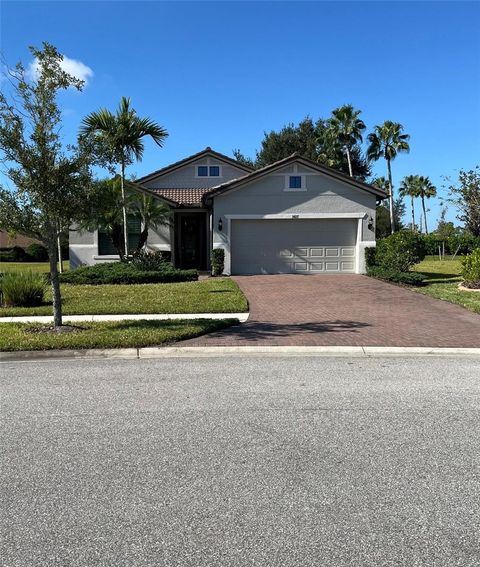 Photo of 1427 Hyssop Loop, North Port, FL 34289 (MLS # O6296851)