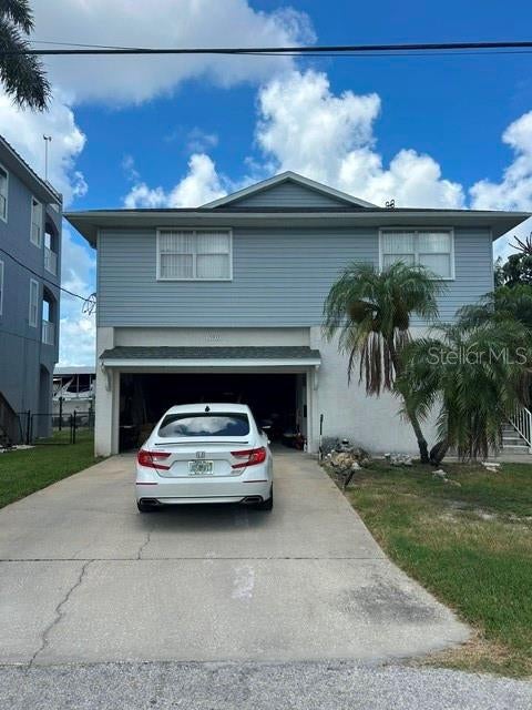Photo of 13937 Ethel Avenue, Hudson, FL 34667 (MLS # TB8542250)