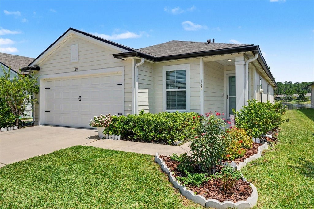 Photo of 769 Grand Reserve Drive, Bunnell, FL 32110 (MLS # FC320606)
