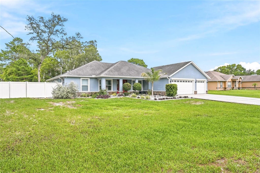Photo of 1180 Battersea Avenue, Spring Hill, FL 34609 (MLS # TB8530613)