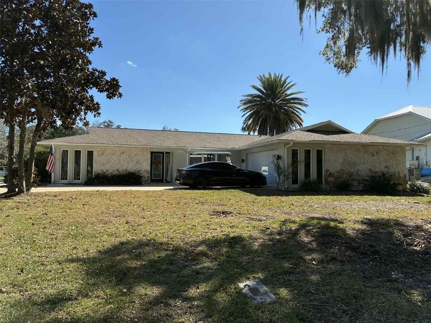 *MOTIVATED SELLER* PRICE IMPROVEMENT*PRICED BELOW APPRAISED VALUE!
Stunning fully renovated modern coastal waterfront home offering 3 bedrooms, 2 baths, and a 2-car garage. The open layout features a beautifully designed chef’s kitchen with soft-close cabinetry, granite countertops, stainless appliances, custom hood, subway tile backsplash, and an oversized sitting island that looks over the living and dinning area.

The primary suite includes sliding glass doors that lead out to the backyard, a spa-style bathroom with dual vanities, Carrara tile, curb-less walk-in shower, and large closet.
The two additional bedrooms are generously sized and offer comfortable accommodations for guests or family. Each room features updated finishes and ample closet space for practical everyday use. A beautiful full guest bathroom, showcasing modern tilework and high-quality fixtures for a fresh, cohesive look.

Upgrades include, Tesla-ready charging connector, new electrical panel outside for future items, all new outlets and switches throughout the house, new dock lighting and power, added outlets for a freezer/ice machine, new blown-in insulation, brand-new water heater, freshly serviced HVAC system, newer dual-pane windows, fresh paint, new flooring in bedrooms and a newer roof. 

Enjoy the screened in lanai, with the view of the canal that goes right out to Crystal River, a private dock with stationary and floating platforms. No deed restrictions so bring your boat, trailer, or RV. Easy parking with a long blocked paved driveway, Minutes to Crystal River Downtown and King’s Bay Riverwalk. What more could you ask for?

Schedule your private tour today!