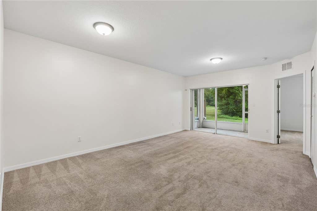 Photo of 522 Villa Del Sol Circle #101, Orlando, FL 32824 (MLS # O6433606)