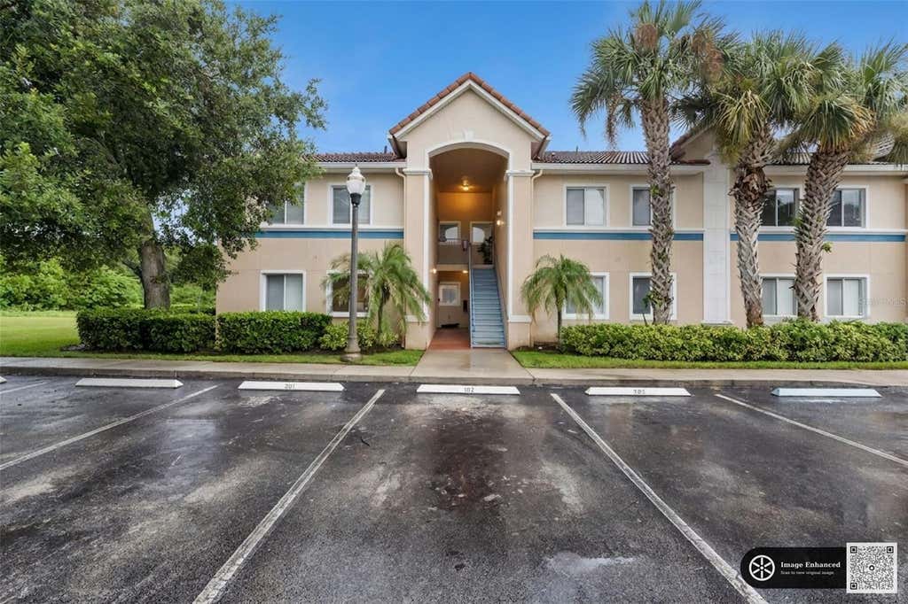 Photo of 522 Villa Del Sol Circle #101, Orlando, FL 32824 (MLS # O6433606)