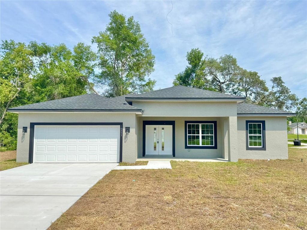 Photo of 10333 N Halsey Way, Citrus Springs, FL 34434 (MLS # O6314380)