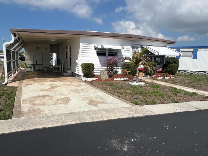 Enjoy the lifestyle you’ve been dreaming of in this five-star, 55+ resident-owned community. Residents have access to wonderful amenities including a refreshing pool, shuffleboard courts, and a welcoming clubhouse that serves as the hub for the many planned activities and social events held throughout the year. The location is ideal, with easy access to nearby shopping centers, a wide variety of restaurants, and everyday conveniences just minutes away. The exceptionally low maintenance fee of only $285 per month includes water, sewer, lawn care, and garbage service, helping keep living both simple and affordable. Travel and recreation are also within easy reach, as the community is conveniently located near two area airports and the beautiful sandy beaches that make Florida living so desirable. Motorcycle and boat owners will also appreciate that both are welcome here, making it easy to bring along your favorite ways to explore.
INTERIOR:
This inviting two bedroom, two bath home is tucked away on a quiet cul-de-sac and offers over 1,000 square feet of comfortable living space. Fully furnished and thoughtfully decorated, it is truly move-in ready so you can begin enjoying your new home right away. The kitchen features light cabinetry and comes equipped with all the necessary appliances, along with a convenient breakfast bar that can also double as a small office or workspace. Just beyond is a dining area with a built-in cabinet, creating a nice transition into the living room where the open layout provides a welcoming place to relax or entertain. From here, step into the light and bright Florida room, an ideal spot to enjoy morning coffee, read a book, or gather with friends. The guest bedroom is generously sized and located near the guest bath, which offers a long vanity along with a combination tub and shower. The spacious primary bedroom provides plenty of room for comfortable furnishings and features its own en suite bath complete with a walk-in shower. Laminate flooring runs throughout most of the home, while the bathrooms are finished with ceramic tile. Updated windows and central air conditioning throughout the home add to the comfort and efficiency of this well-maintained property.This inviting two bedroom, two bath home is tucked away on a quiet cul-de-sac and offers over 1,000 square feet of comfortable living space. Fully furnished and thoughtfully decorated, it is truly move-in ready so you can begin enjoying your new home right away. The kitchen features light cabinetry and comes equipped with all the necessary appliances, along with a convenient breakfast bar that can also double as a small office or workspace. Just beyond is a dining area with a built-in cabinet, creating a nice transition into the living room where the open layout provides a welcoming place to relax or entertain. From here, step into the light and bright Florida room, an ideal spot to enjoy morning coffee, read a book, or gather with friends. The guest bedroom is generously sized and located near the guest bath, which offers a long vanity along with a combination tub and shower. The spacious primary bedroom provides plenty of room for comfortable furnishings and features its own en suite bath complete with a walk-in shower. Laminate flooring runs throughout most of the home, while the bathrooms are finished with ceramic tile. Updated windows and central air conditioning throughout the home add to the comfort and efficiency of this property.