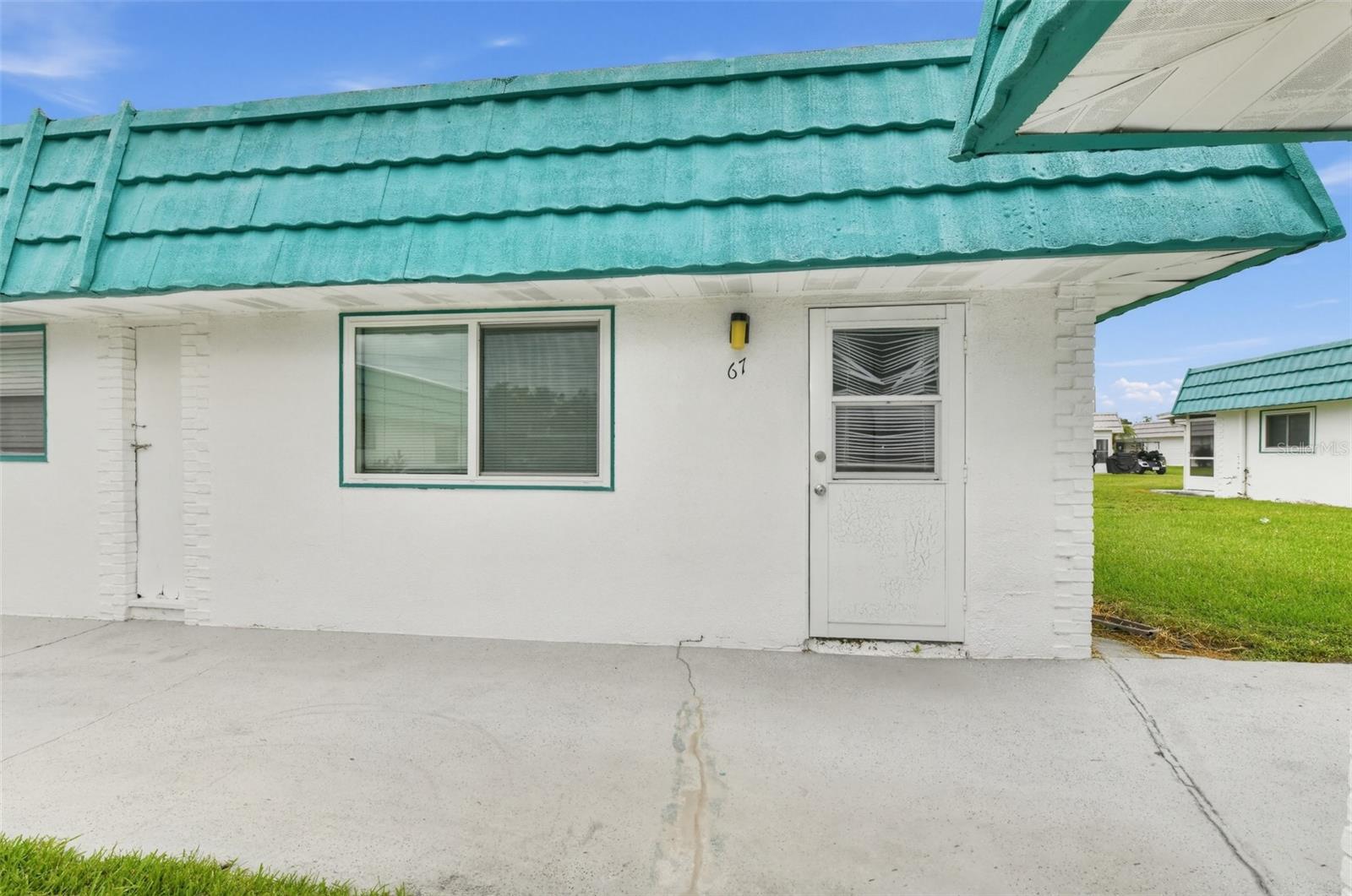 205 KINGS BOULEVARD 67, SUN CITY CENTER, FL, 33573 1 205 KINGS BOULEVARD 67