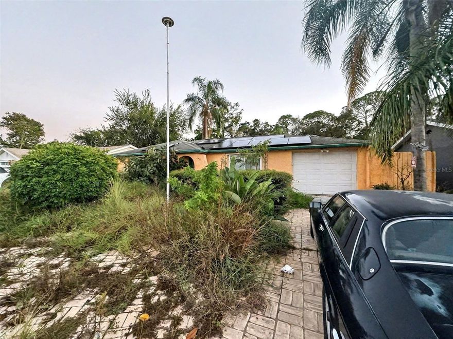 *NEW PRICE* Opportunity knocks with this solid block 2-bedroom, 1-bath home featuring a sparkling in-ground pool in the heart of Port Richey! This property offers great bones and a functional open layout ready for your custom renovation or next long-term rental project. The home features a new roof, a generous 1,040 sq ft of living space, and a bright, open kitchen overlooking the pool area—perfect for modern redesign possibilities. Situated on a quiet street of established homes, this property’s block construction provides durability and peace of mind.

Ideal for investors or homeowners looking to create equity, the home is currently vacant and ready for work to begin. Enjoy nearby shopping, dining, beaches, and convenient access to US-19 and the Suncoast Parkway. With limited inventory and rising neighborhood values, this is an excellent opportunity to bring your vision to life in Pasco County!