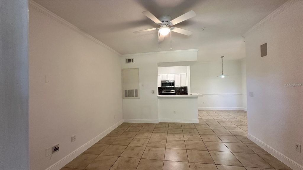 Photo of 14238 Fredricksburg Drive #313, Orlando, FL 32837 (MLS # O6390939)