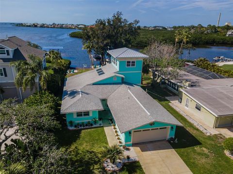 Photo of 1626 Sea Breeze Drive, Tarpon Springs, FL 34689 (MLS # W7884328)