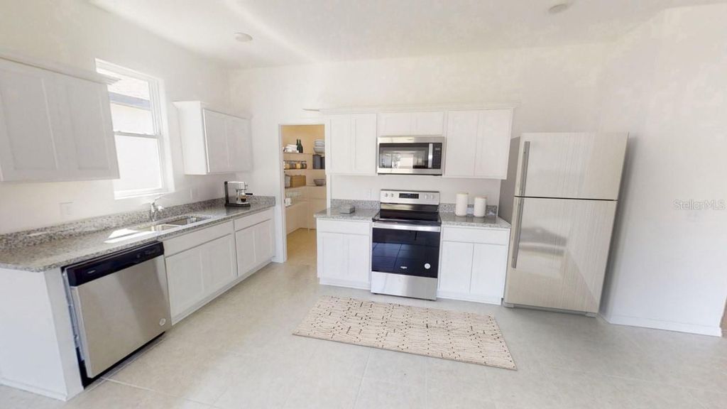 Photo of 474 Hennepin Loop, Lake Wales, FL 33898 (MLS # O6390435)