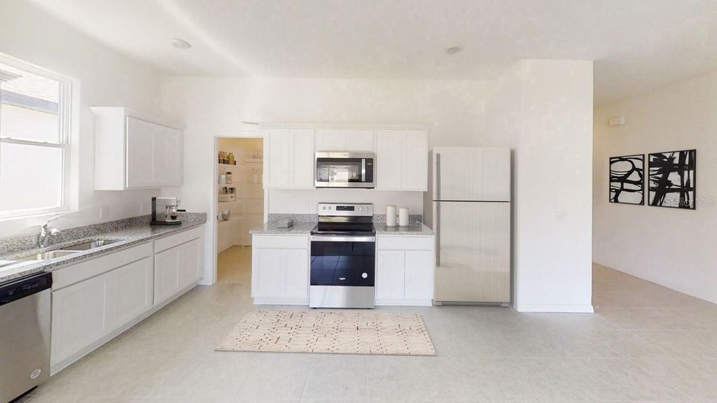 Photo of 474 Hennepin Loop, Lake Wales, FL 33898 (MLS # O6390435)