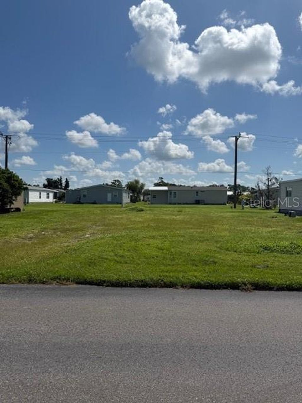 Photo of 233 El Prado Ave, North Port, FL 34287 (MLS # TB8418939)