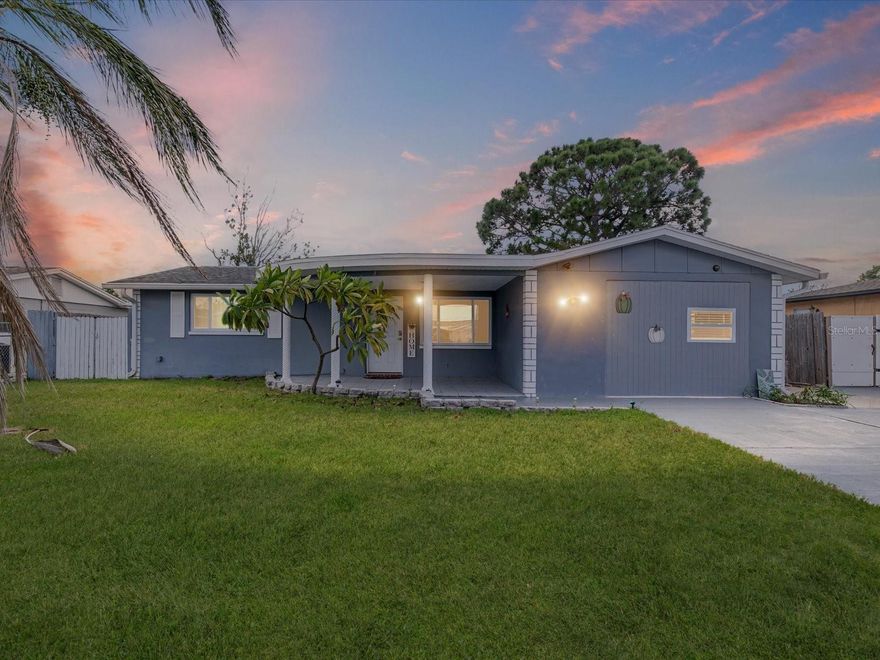 Immaculate and tastefully updated single-family residence featuring 2 bedrooms, 1 bathroom, and an inviting open floor plan. Porcelain tile flows seamlessly throughout the main living areas, creating a clean and modern aesthetic.  The spacious kitchen offers ample counter space, newer appliances, a breakfast bar, and French doors that open to a covered screened patio with an additional pavered area—perfect for outdoor dining and entertaining. The fully fenced backyard provides privacy and includes a large storage shed.  Additional highlights include:  Generously sized laundry room with washer & dryer included, Garage conversion into an in-law suite with its own kitchen, bathroom, and standing shower (garage door remains for easy conversion back). Roof (2016), Main HVAC (2017), Tankless water heater (2023), Updated windows (2024), Updated electrical panel & programmable thermostat.  Being sold furnished for added convenience.  Ideally located close to parks, beaches, restaurants, hospitals, and recreational facilities, this home combines comfort, functionality, and modern upgrades—ready for its new owner to move right in!