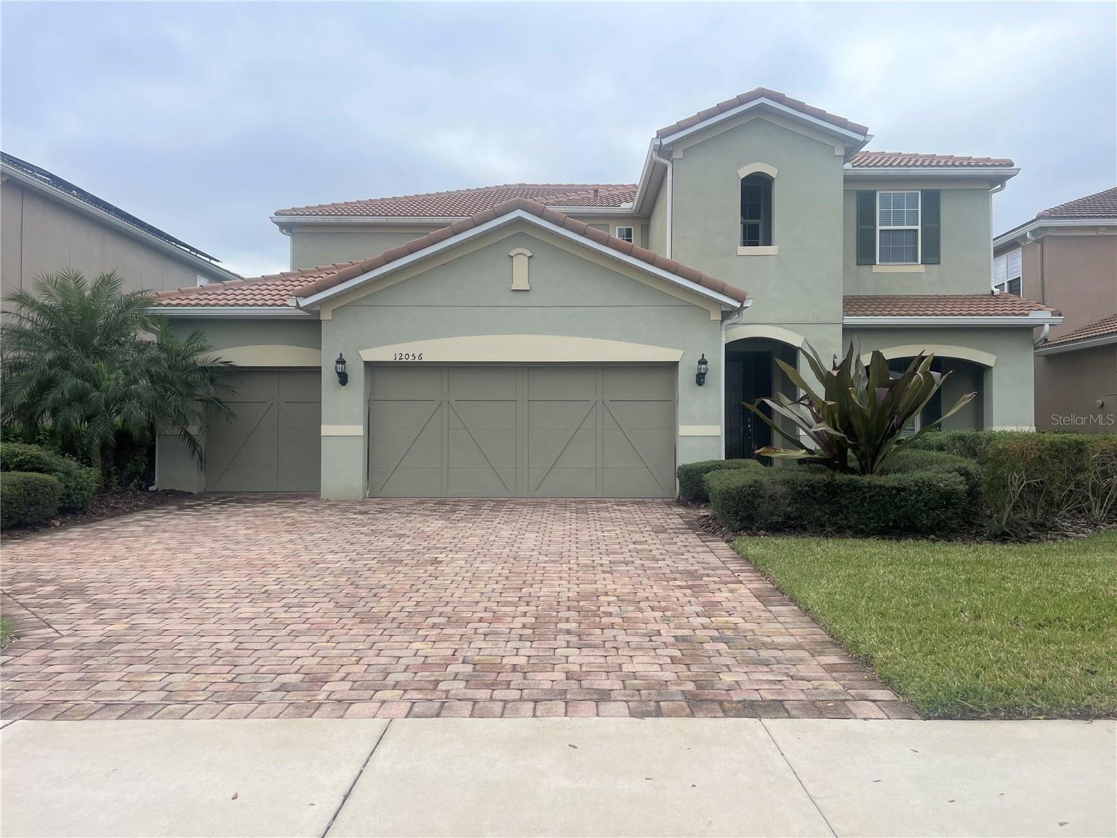 In the heart of Lake Nona, you will find this amazing furnished 4bed/3 bath /2 half baths 3 car garage home at VillageWalk, a unique resort-style community. Huge and beautiful kitchen, 42" cabinets, granite countertops, huge island, perfect for entertaining family and friends. Enjoy the beautiful water view. The home has a tile roof also brick paver throughout the driveway. ideal home for a large family. Community HOA includes all grass cutting, landscaping, fertilizing, irrigation water, alarm monitoring, internet, cable tv, phone line, and a 26,000 SF amenity center with 2 pools, 6 tennis courts, basketball courts, fitness center, over 6 miles of a walking trail. Location location location with easy access to Medical City, highways, and airport. You can't miss this opportunity in the unique Lake Nona