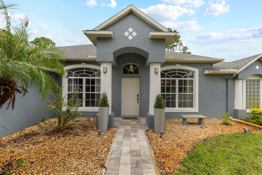 Photo of 511 N Pine Meadow Drive, Debary, FL 32713 (MLS # O6344694)