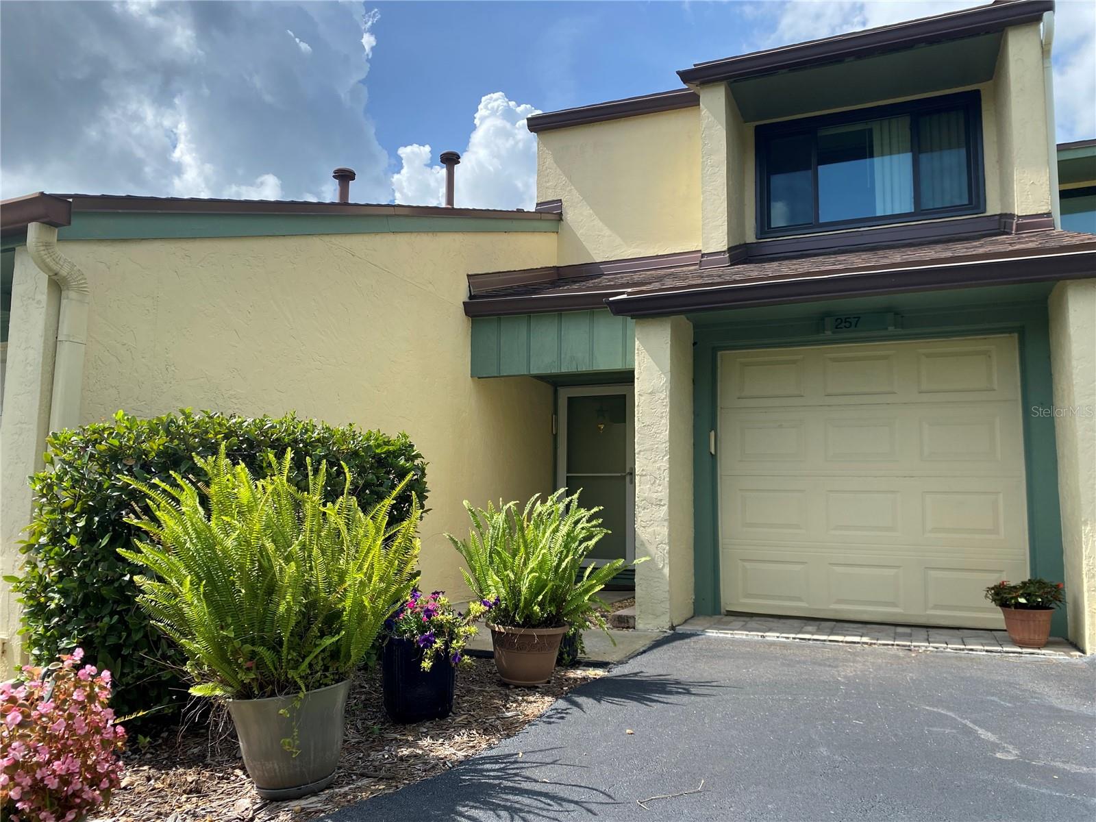 REDUCED!!!Immediate possession!! This community is made up of only 80 units!! Very pet friendly and HIGH and DRY!! Welcome to Pine Valley condominiums, a quiet and refined community tucked within the exclusive Sugar Mill Country Club area. This spacious two-bedroom, two-and-a-half bath residence offers comfort, style, and peaceful golf course views-all just 15 minutes from the beach.
Newer Andersen windows throughout bring in natural light and showcase the serene surroundings, while luxury plank vinyl flooring adds a clean, contemporary touch. The open living and dining areas allow an easy, inviting flow and a newer air conditioning system ensures comfort year-round. Both bedrooms are generously sized with access to full baths upstairs, while convenient half-bath is located downstairs-perfect for guests. Step outside and enjoy morning coffee with fairway views, or take a short walk or golf cart ride to the Sugar Mill CC next door. Located within Sugar Mill, a gated and golf friendly community, Pine Valley offers secure, relaxed living in one of the area's most desirable neighborhoods.