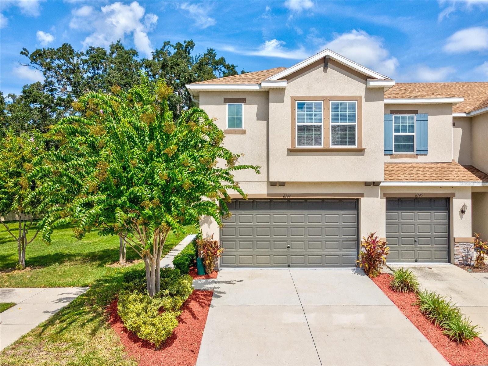 PRICED BELOW MARKET VALUE! Seller is offering $5,000 to buyer at closing towards closing costs or rate buydown.
Welcome to Bridgehaven at Citrus Park! This beautifully updated Liberty Model End Unit sits on a premium corner lot with no side or rear neighbors, surrounded by serene conservation land. Built in 2020, it’s one of the newest and largest models in the community, offering 3 bedrooms, 2.5 baths, and a 2-car garage. The open-concept floorplan is filled with natural light. The kitchen features soft-close
cabinetry, pull-out shelves, a large island with seating for four, and a spacious pantry. Upstairs, enjoy a versatile loft (pictured as an office), convenient laundry room, and all three bedrooms. The primary suite overlooks greenspace and includes a large walk-in closet and en-suite bathroom with oversized shower and dual vanities. Relax or entertain on the enclosed lanai, with views of lush greenery, wild life and oak
trees. Additional highlights include an in-wall pest control system, prewired security system, and custom-fitted hurricane panels.
Bridgehaven is a low-maintenance community with an HOA fee that includes cable, high speed internet, exterior maintenance, roof reserves, and access to the resort-style pool and cabana. Located in Flood Zone X (no flood insurance required) and just minutes from shopping, dining, the airport, and major highways.