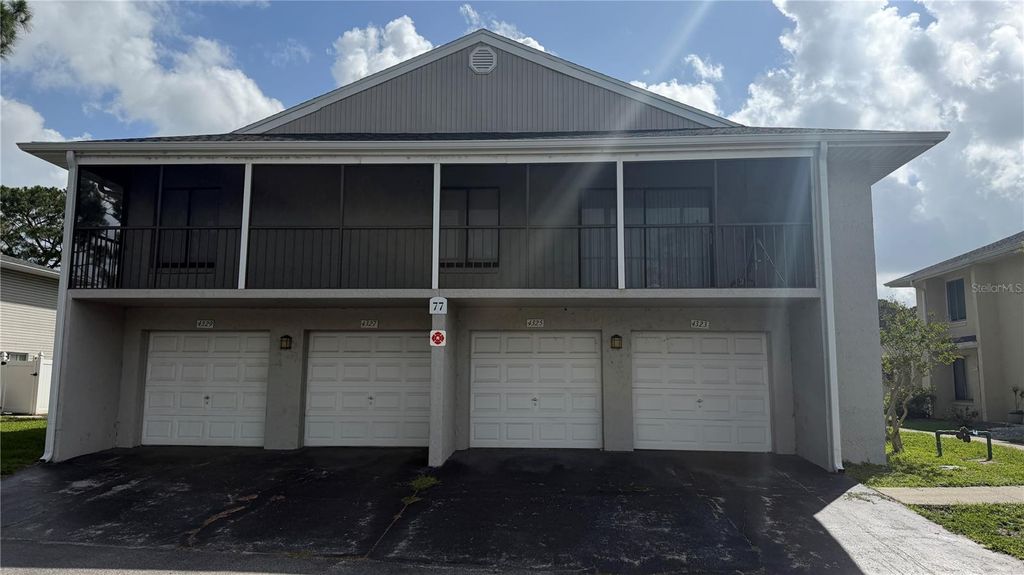 Photo of 4323 Pinebark Avenue #77-1, Orlando, FL 32811 (MLS # O6410995)
