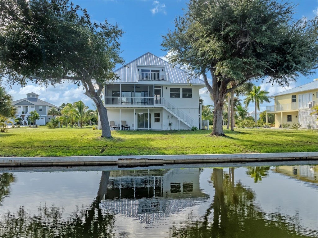 Photo of 13075 Via Cassia, Placida, FL 33946 (MLS # TB8538376)