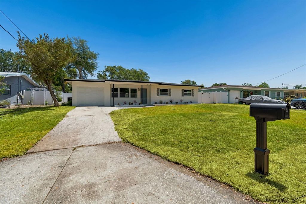 Photo of 10229 N Valle Drive, Tampa, FL 33612 (MLS # TB8504268)