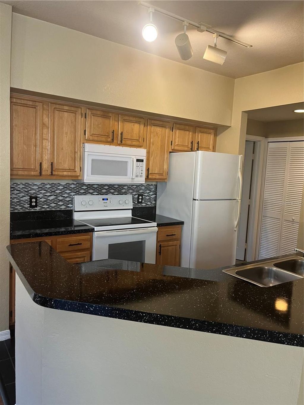 Photo of 5971 Westgate Drive #1212, Orlando, FL 32835 (MLS # O6386185)