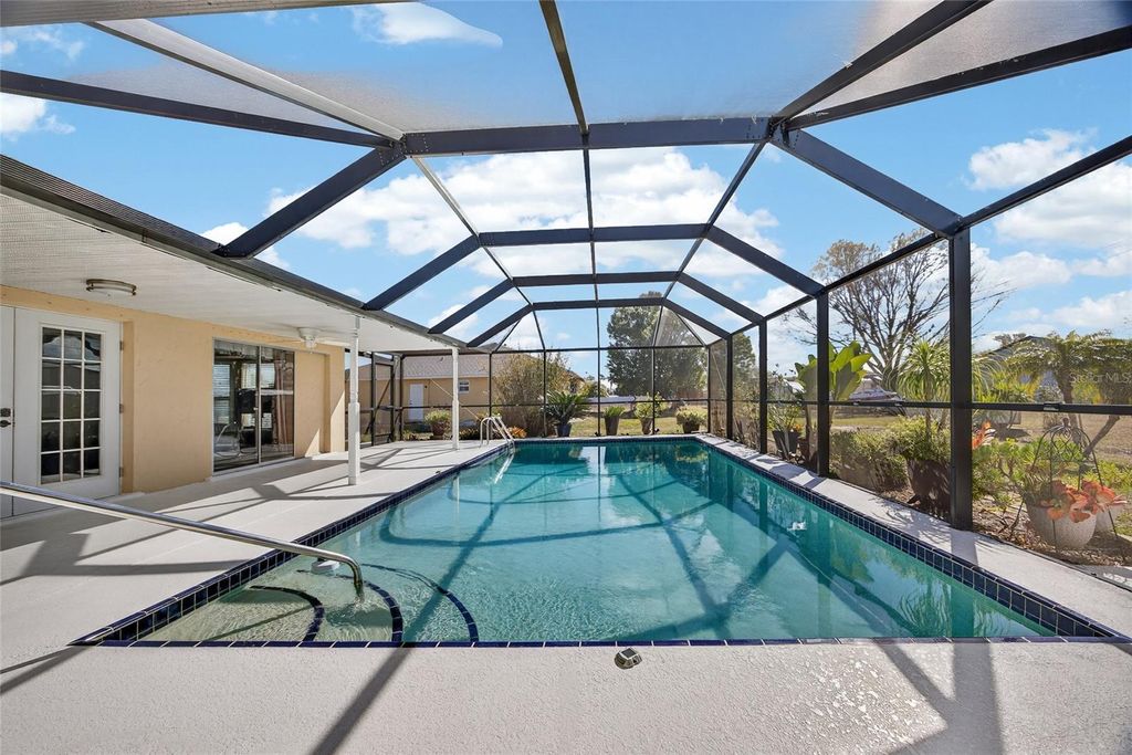 Photo of 441 Chestnut Avenue NW, Port Charlotte, FL 33952 (MLS # C7522488)