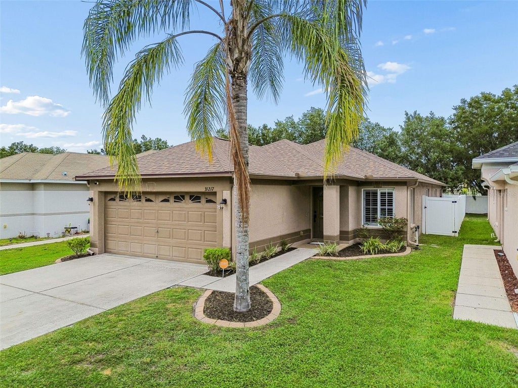 Photo of 31217 Tagus Loop, Wesley Chapel, FL 33545 (MLS # TB8505746)