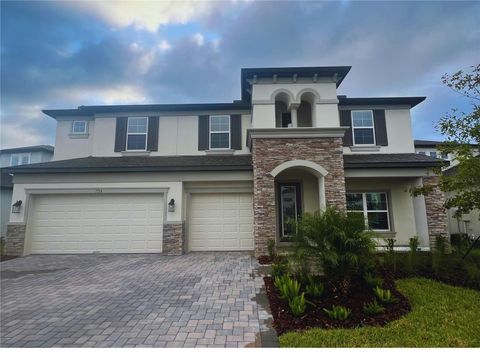 Photo of 7728 Hemlock Seed Drive, Wesley Chapel, FL 33545 (MLS # J980848)
