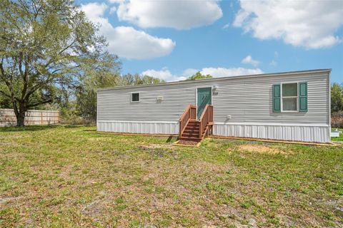 Photo of 808 SE 124th Avenue, Webster, FL 33597 (MLS # O6388701)