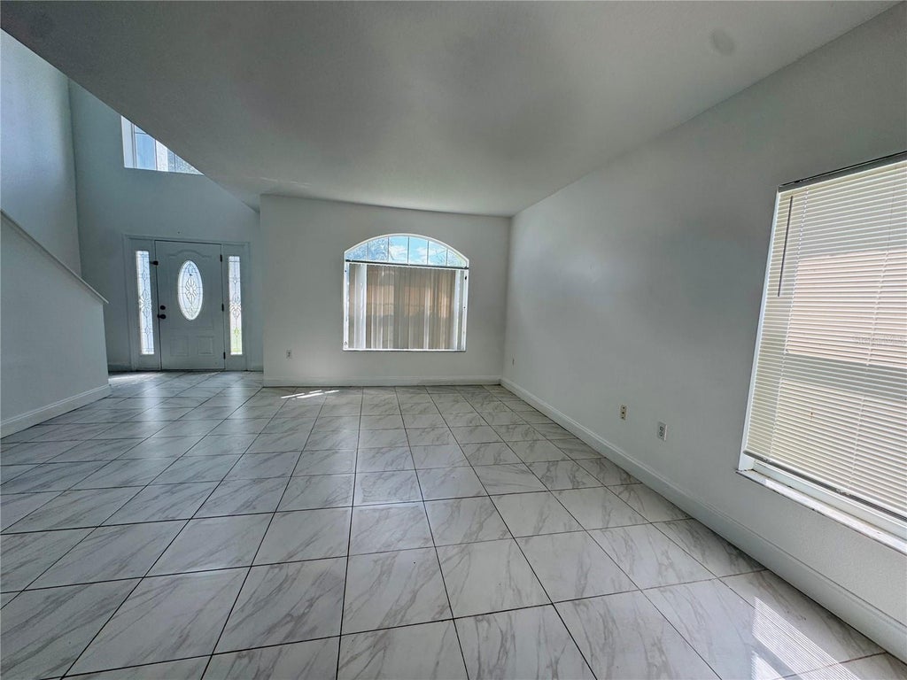 Photo of 566 Eagle Court, Poinciana, FL 34759 (MLS # S5156797)