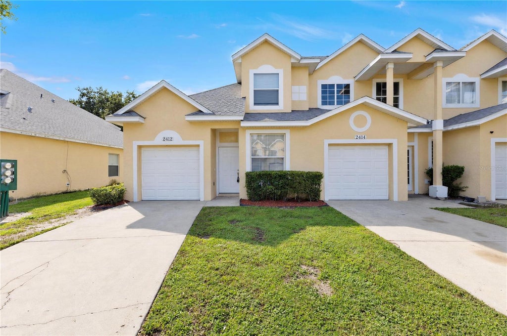 Photo of 2412 Temple Grove Lane, Kissimmee, FL 34741 (MLS # O6450035)