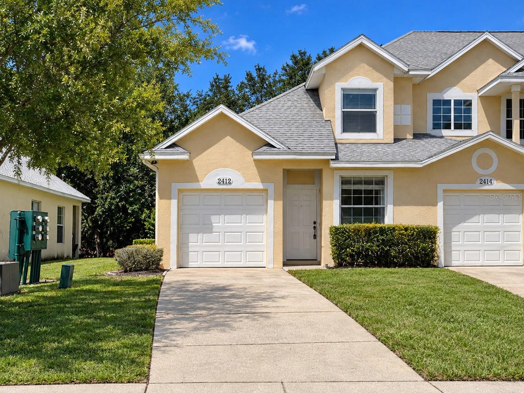 Photo of 2412 Temple Grove Lane, Kissimmee, FL 34741 (MLS # O6450035)