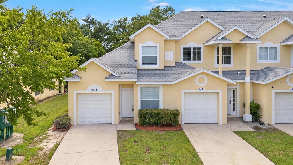 Photo of 2412 Temple Grove Lane, Kissimmee, FL 34741 (MLS # O6450035)