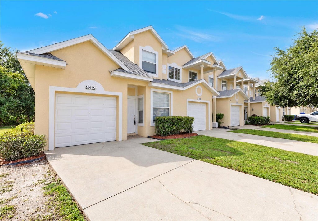 Photo of 2412 Temple Grove Lane, Kissimmee, FL 34741 (MLS # O6450035)
