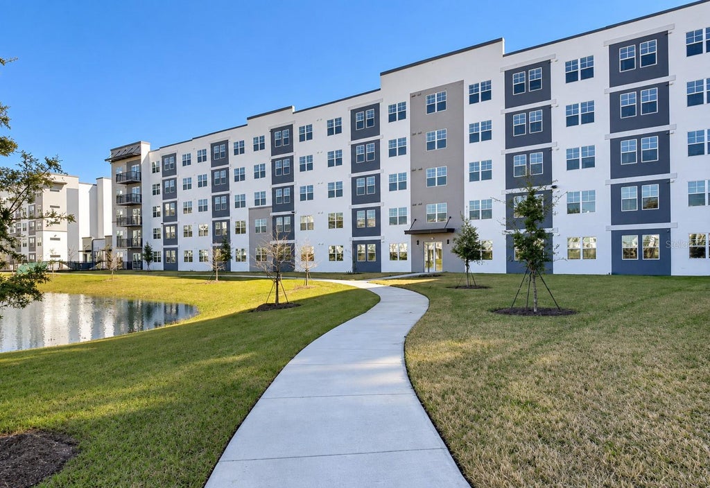 Photo of 5587 Millenia Boulevard #213, Orlando, FL 32839 (MLS # O6452667)