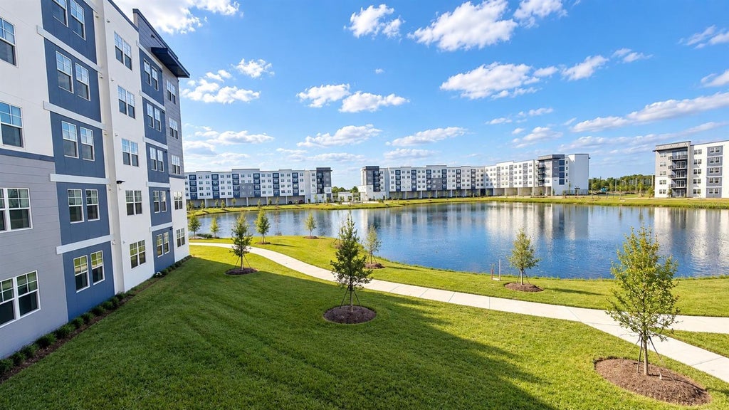 Photo of 5587 Millenia Boulevard #213, Orlando, FL 32839 (MLS # O6452667)