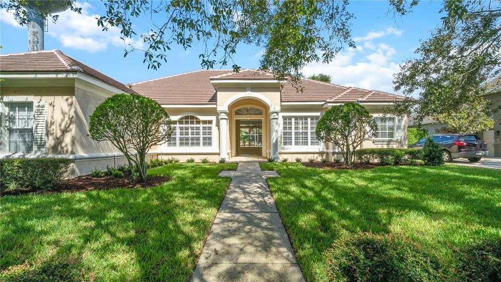 Photo of 7773 Debeaubien Drive, Orlando, FL 32835 (MLS # O6393673)