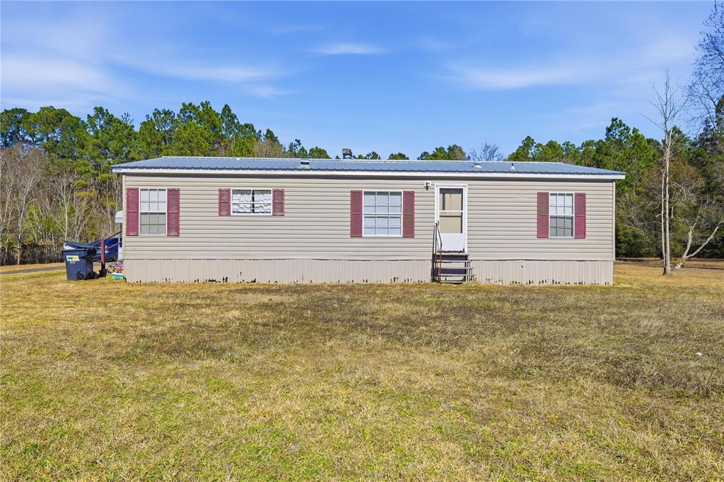 Photo of 44326 Woodland Circle, Callahan, FL 32011 (MLS # O6389276)