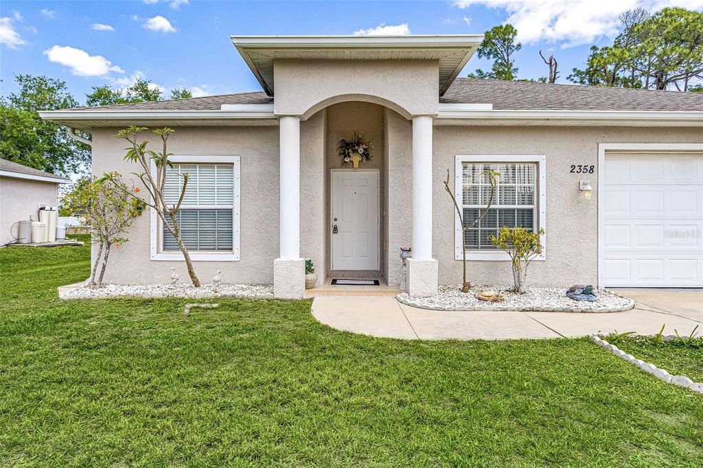 Photo of 2358 Pilger Avenue, North Port, FL 34286 (MLS # C7524875)