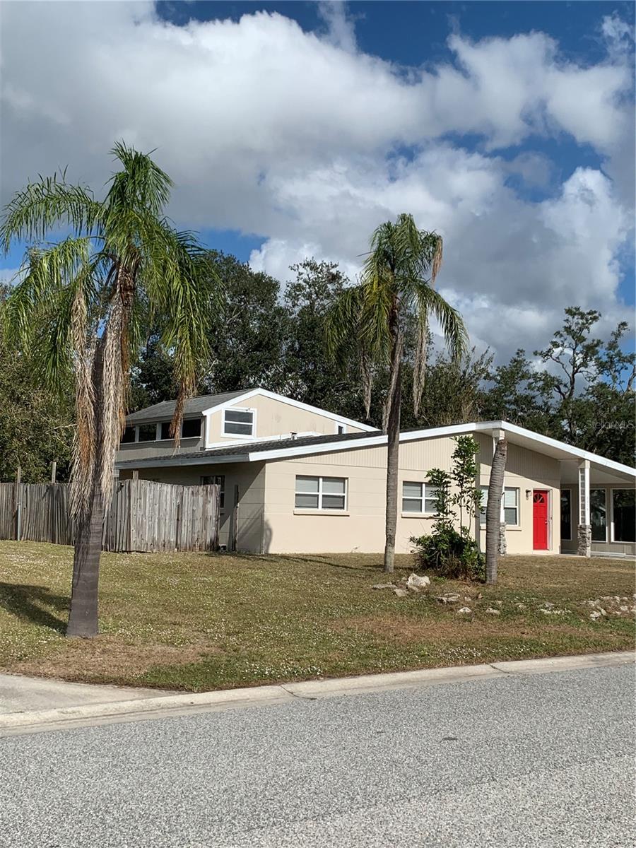 Income opportunity !! Lowest Priced 5/3 Remodeled 2 story home in Sarasota. Complete with separate 2 Main Bed 2 Bath in-law suite quarters Keep in laws with super Primary bedroom upstairs with own bath and private deck and another primary bedroom with own bath downstairs. You could rent it out as an attached ADU. These two separate nicely configured design has great possibilities for large family or even short term rental being close to downtown and beaches. Currently getting $1600 for 1 side and earning potential for the whole place is great! The front would also be perfect for someone to move in right away.