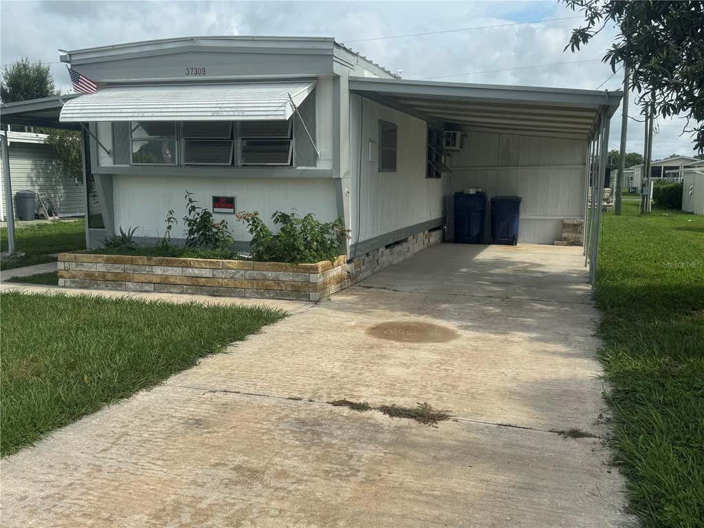 Photo of 37309 8th Avenue #161, Zephyrhills, FL 33542 (MLS # TB8525974)