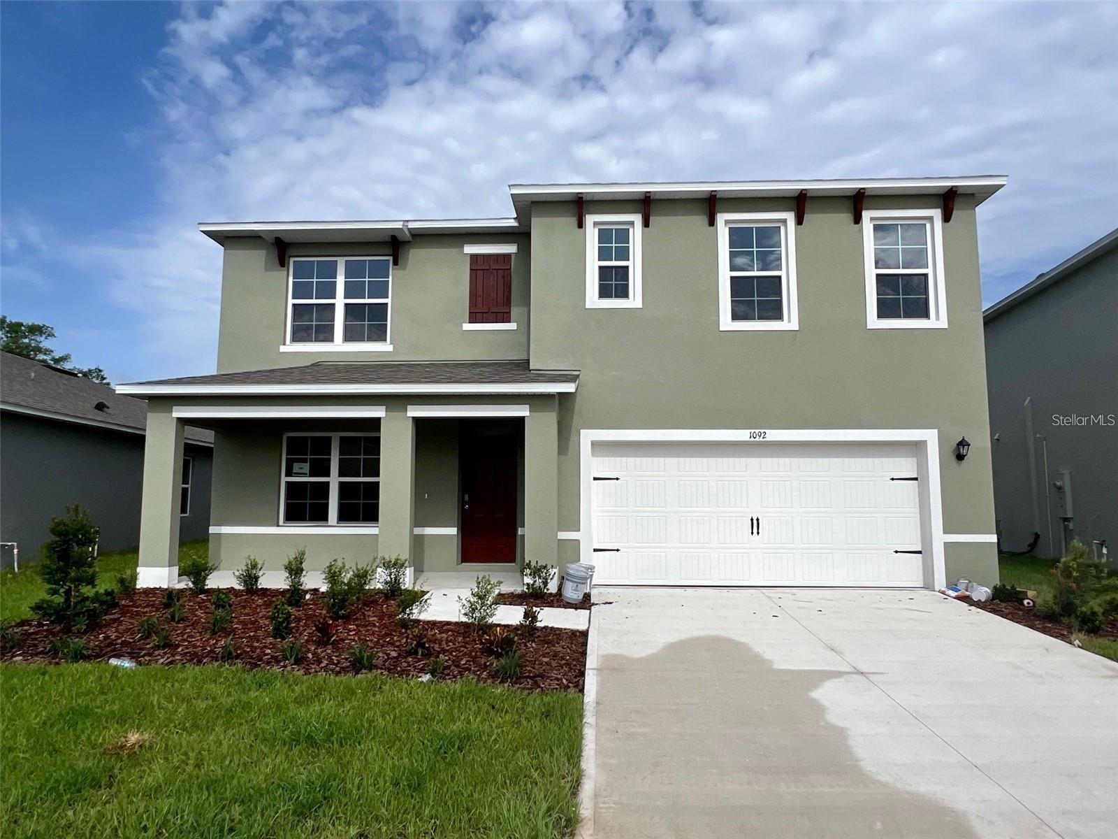 Welcome to this stunning 5-bedroom, 3-bath, 2-story home offering 2,696 sq ft of modern living space with a thoughtful layout and stylish finishes. A spacious front porch welcomes you inside to an open-concept kitchen with stainless steel appliances, seamlessly connected to the dining and living areas—ideal for entertaining family and friends. The first floor also features a dedicated office, perfect for remote work or study. Upstairs, a versatile loft provides extra living space for a playroom, media room, or home gym. The primary suite boasts a spa-like bathroom and a walk-in closet, creating a private retreat. Step outside to enjoy the expansive backyard with endless possibilities for outdoor fun, gatherings, or simply relaxing. Additional highlights include a 2-car garage, energy-efficient systems, and indoor laundry. Conveniently located just minutes from Walmart, with a new Target coming soon, this move-in ready home is close to schools, shopping, dining, and major highways—making it the perfect blend of comfort, style, and convenience.
