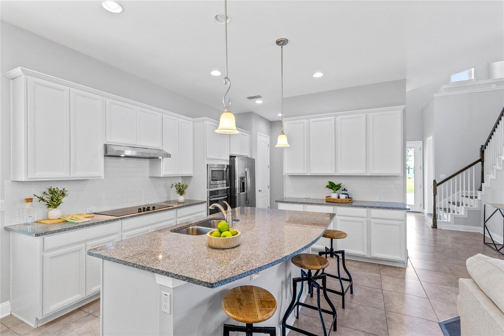 Photo of 7749 Laureate Boulevard, Orlando, FL 32827 (MLS # O6450950)